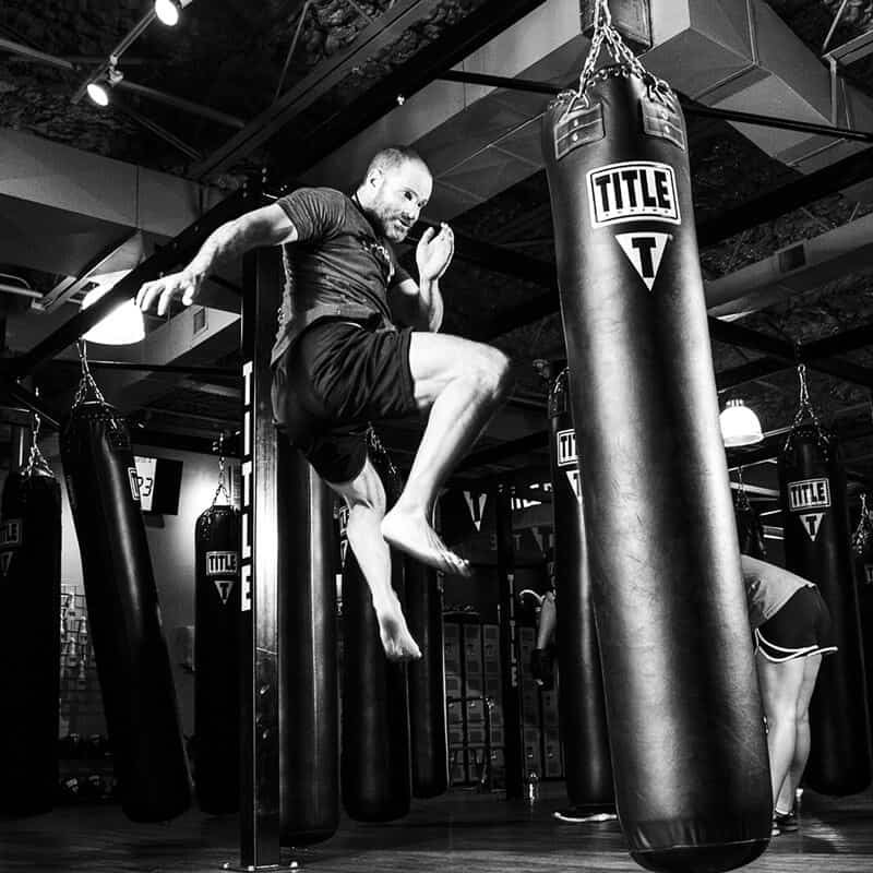 Mixed Martial Arts Lessons for Adults in Lewisville TX - Flying Knee Black and White MMA